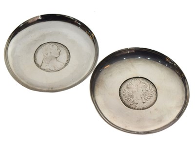 Lot 207 - Two white metal coin dishes each inset with Maria Theresa Thaler