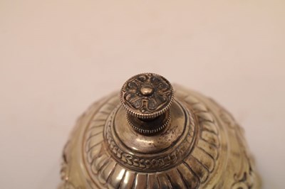 Lot 83 - Silver desk or call bell with embossed and pierced floral decoration