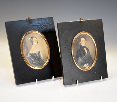 Lot 281 - Pair of naive portrait miniatures in ebonised frames