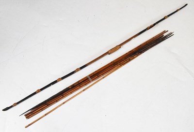 Lot 213 - Ethnographica - Eight South American carved wooden arrows and bow