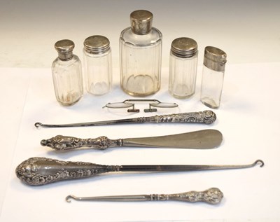 Lot 188 - Quantity of silver topped glass jars, silver handled requisites, etc