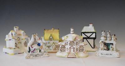 Lot 484 - Four Coalport cottages and two fairings