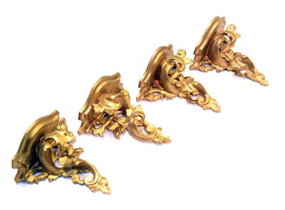 Lot 653 - Four gilt gesso wall bosses