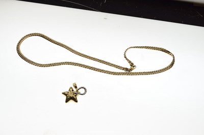 Lot 40 - 18ct gold diamond set star pendant, with a 9ct gold chain, 14.8g gross approx