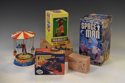 Lot 309 - Quantity of boxed reproduction tin toys