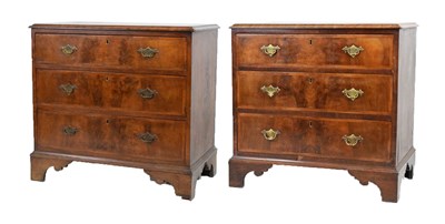 Lot 456 - Pair of walnut three-drawer chests