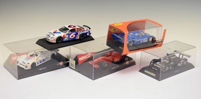 Lot 331 - Group of plastic-cased slot cars to include; Ninco, Slot.it & Scalextric