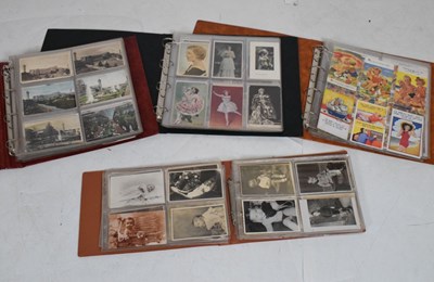 Lot 244 - Quantity of postcards in four albums