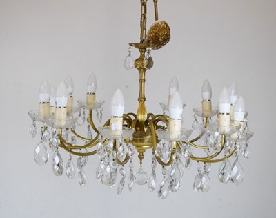 Lot 749 - Twelve branch lustre electric brass chandelier