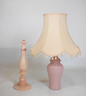 Lot 683 - Pink onyx table lamp base together with a pink glazed ceramic table lamp