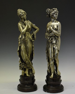 Lot 582 - Pair of silver coloured figures of classical maidens