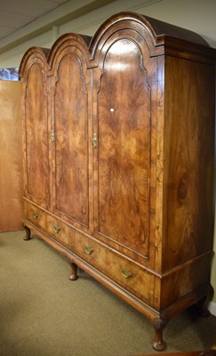 Lot 521 - Queen Anne-Style walnut three-section domed wardrobe