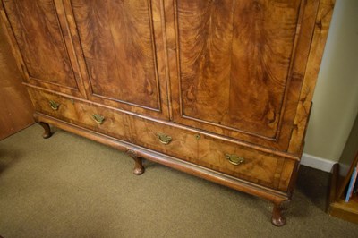 Lot 521 - Queen Anne-Style walnut three-section domed wardrobe