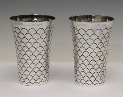 Lot 96 - Pair of Victorian silver beakers of tapering form with fish-scale decoration