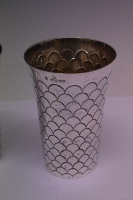Lot 96 - Pair of Victorian silver beakers of tapering form with fish-scale decoration