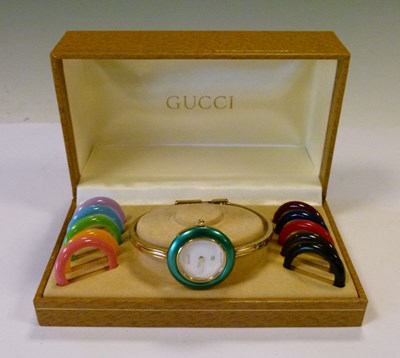 Lot 70 - Gucci lady's bracelet watch, with ten separate interchangeable bezels