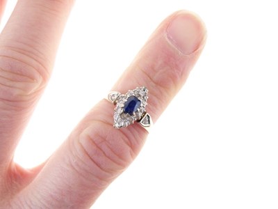 Lot 13 - Sapphire and diamond marquise shaped cluster ring