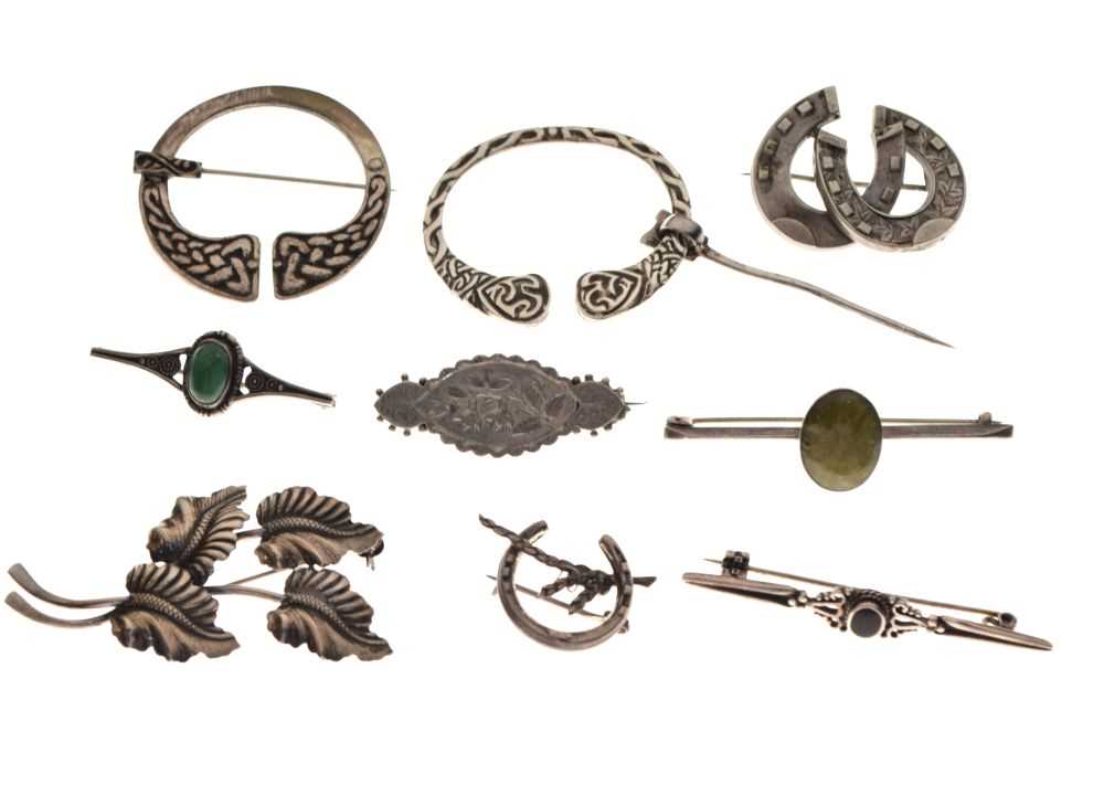 Lot 72 - Nine assorted silver brooches