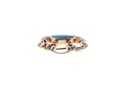 Lot 34 - Diamond, ruby and opal doublet brooch