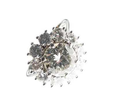 Lot 7 - Eleven stone diamond 18ct white gold cluster ring
