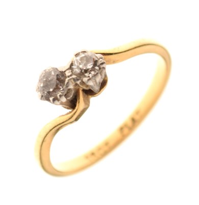Lot 9 - Two stone diamond crossover ring