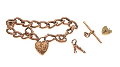 Lot 56 - 9ct rose gold charm bracelet