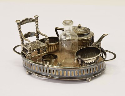 Lot 81 - Silver miniature teaset, tray and miniature chair