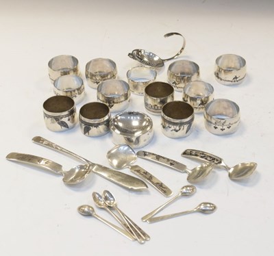 Lot 208 - Thirteen white metal niello napkin rings and a selection of niello spoons, etc