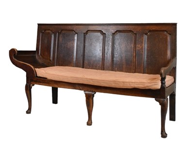 Lot 467 - Unusual George III oak settle