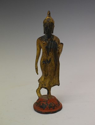 Lot 249 - Early Thai gilt alloy figure of a standing Buddha