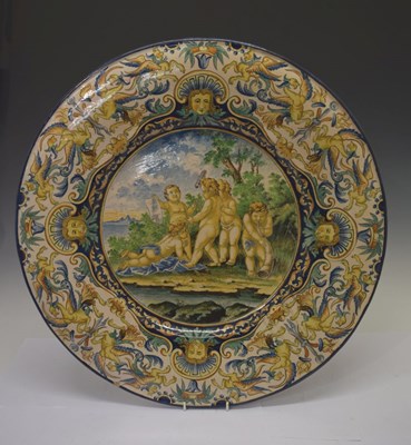 Lot 298 - Large Italian maiolica charger, amorini