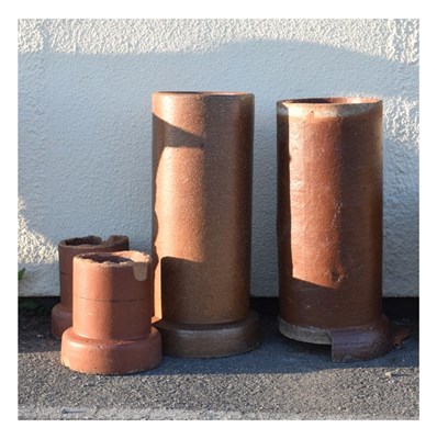 Lot 684 - Ceramic drain pipes and composite stone planter