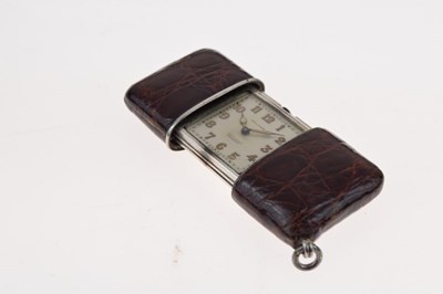 Lot 108 - Movado- Art Deco  silver rectangular cased purse watch with leather mounts