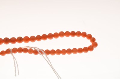Lot 79 - Coral bead necklet with paste clasp
