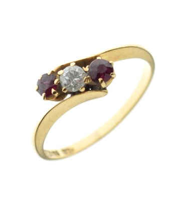 Lot 16 - Ruby and diamond three-stone crossover ring