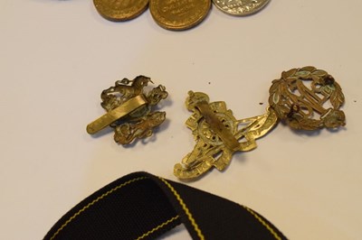 Lot 315 - Three First World War Medals and cap badges