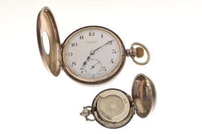 Lot 123 - George V silver half hunter pocket watch, together with a silver Sovereign holder