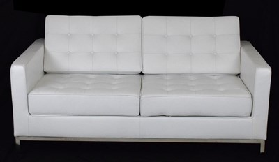 Lot 585 - White leather two-seater settee and footstool