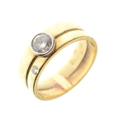 Lot 5 - Unmarked yellow metal combined engagement ring and wedding band