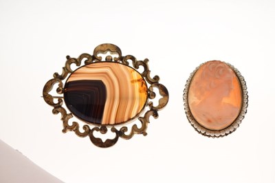 Lot 26 - Cameo brooch with seed pearl surround, and an agate brooch (2)