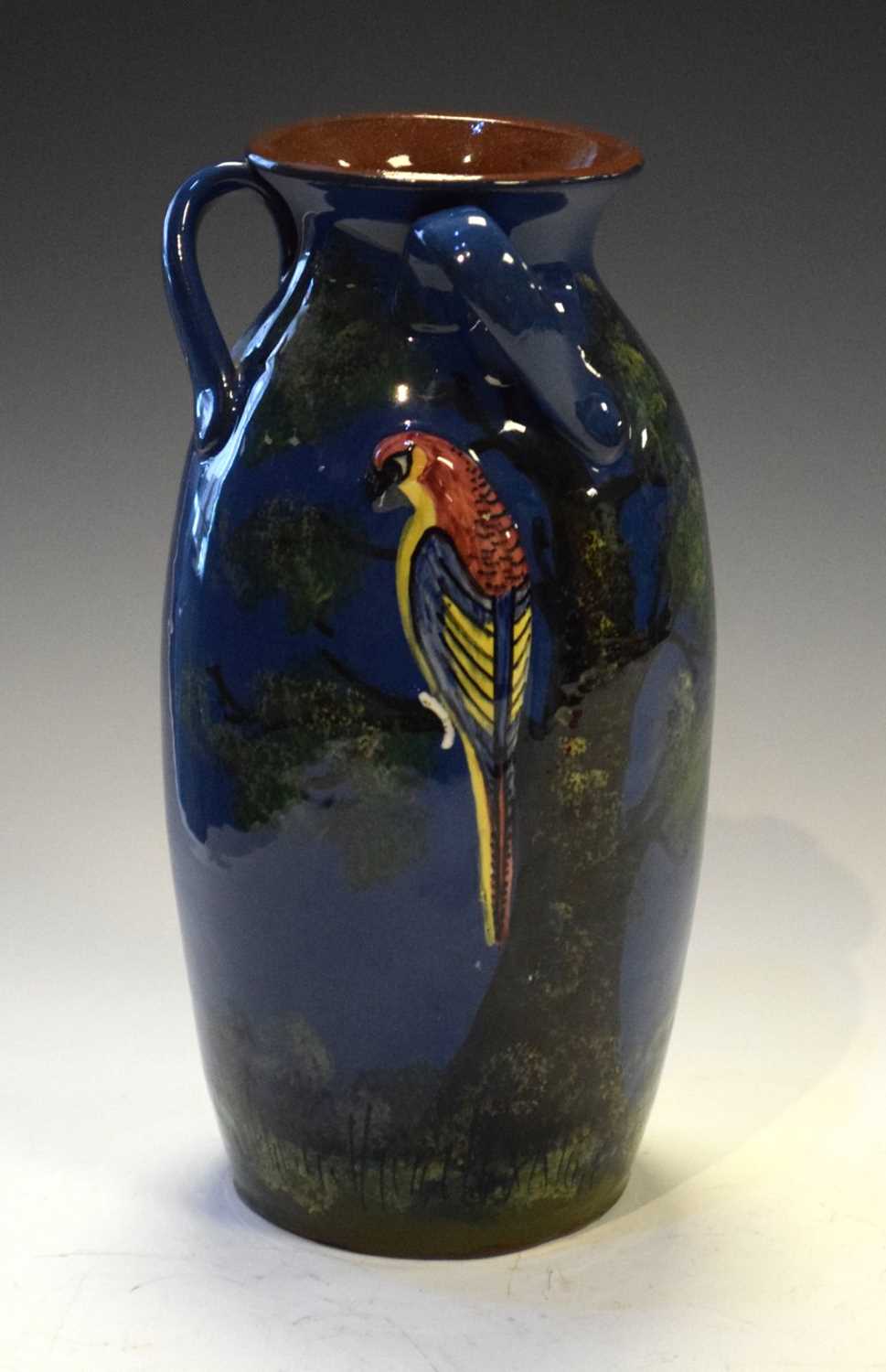 Lot 396 - Torquay ware pottery parrot vase