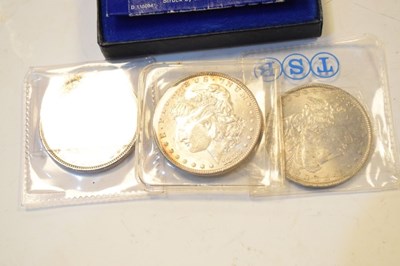 Lot 143 - Coins - Three silver American Dollars and a sterling Barbados ten dollar proof coin