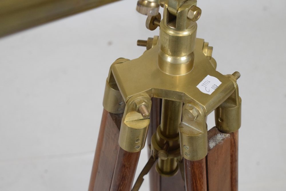 Lot 247 - Reproduction brass telescope on a tripod