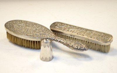 Lot 209 - Two Chinese white-metal backed brushes with marks for LuenWo, Shanhai