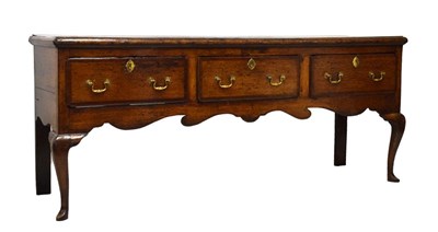 Lot 500 - George III crossbanded oak low dresser