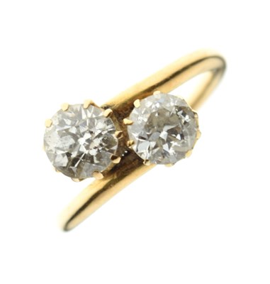 Lot 6 - Two-stone diamond crossover ring