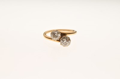 Lot 6 - Two-stone diamond crossover ring