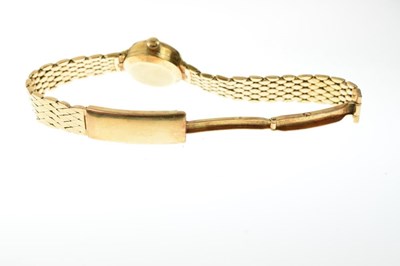 Lot 54 - Omega Ladymatic - Lady's 18ct gold bracelet watch