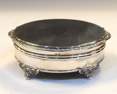 Lot 171 - Elizabeth II silver dressing table box of oval form
