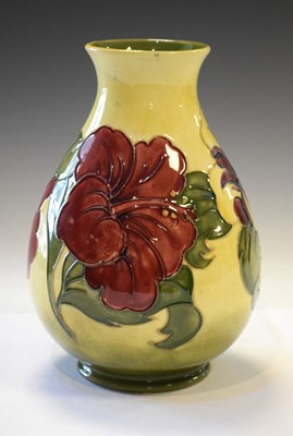 Lot 374 - Moorcroft - Hibiscus pattern bulbous vase